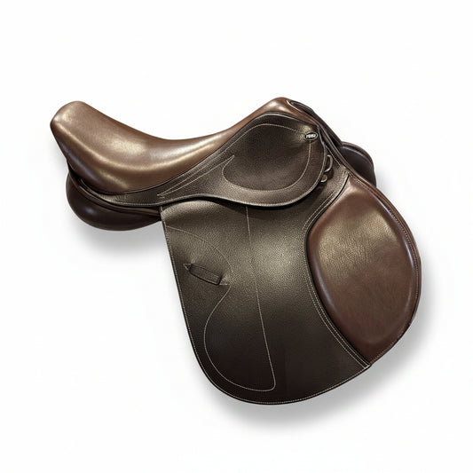 HKM Jumping Saddle Canyon – Dark Brown on a white saddle pad, showcasing premium calf leather and sleek design.